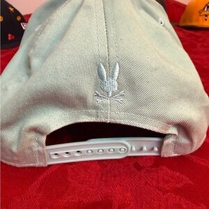 Psycho Bunny mint green snapback hat with embroidered logo